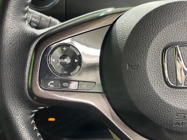 Ｎ－ＢＯＸカスタム Ｇ・Ｌターボホンダセンシング　４ＷＤ　両側電動ドア　純正ＳＤナビ　バックカメラ　衝突被害軽減システム　禁煙車　ハーフレザーシート　コーナーセンサー　スマートキー　ＬＥＤヘッド　ビルトインＥＴＣ　クルコン　純正１４インチアルミ（24枚目）