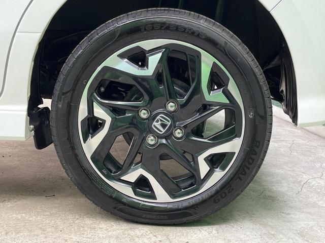 Ｎ－ＢＯＸカスタム Ｇ・Ｌターボホンダセンシング　４ＷＤ　両側電動ドア　純正ＳＤナビ　バックカメラ　衝突被害軽減システム　禁煙車　ハーフレザーシート　コーナーセンサー　スマートキー　ＬＥＤヘッド　ビルトインＥＴＣ　クルコン　純正１４インチアルミ（53枚目）