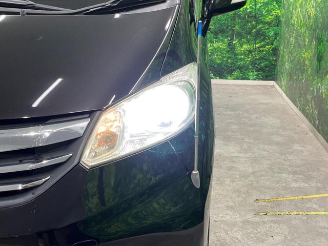 フリード Ｇ　ジャストセレクション　４ＷＤ　電動スライドドア　純正ＳＤナビ　バックカメラ　寒冷地仕様　禁煙車　スマートキー　ＨＩＤヘッド　ビルトインＥＴＣ　オートエアコン　Ｂｌｕｅｔｏｏｔｈ　ＣＤ　ＤＶＤ再生　地デジ（13枚目）