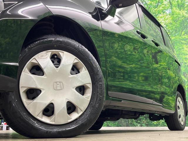 フリード Ｇ　ジャストセレクション　４ＷＤ　電動スライドドア　純正ＳＤナビ　バックカメラ　寒冷地仕様　禁煙車　スマートキー　ＨＩＤヘッド　ビルトインＥＴＣ　オートエアコン　Ｂｌｕｅｔｏｏｔｈ　ＣＤ　ＤＶＤ再生　地デジ（14枚目）