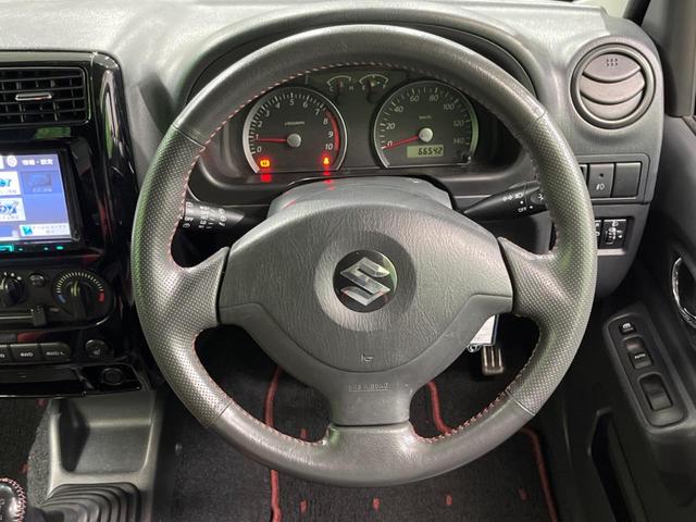 ジムニー クロスアドベンチャー 4WD MT車 SDナビ 禁煙車 レザーシート シートヒーター 純正16インチアルミ CD DVD再生 地デジ(11枚目)