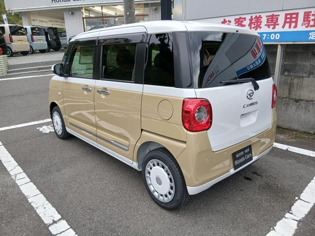 ムーヴキャンバス ストライプスＧ　届出済未使用車　２トーン　９インチディスプレイオーディオ　バックカメラ　ドアバイザー　フロアマット　衝突軽減ブレーキ　両側電動スライドドア　シートヒーター　ホッとカップホルダー　ＨＤＭＩ　６カ月保証（3枚目）
