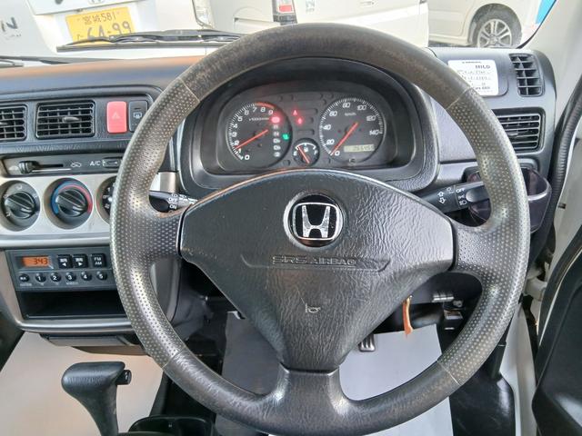 アクティバン 　４ＷＤ　オートマ　ＡＭ／ＦＭラジオ　１スピーカー　マニュアルエアコン　両席ＳＲＳ　リアワイパー　リア熱線　電動パワーステアリング（5枚目）