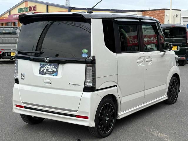 N-BOXカスタム 2トーンカラースタイル G・ターボLパッケージ ナビ TV CD DVD Bluetooth バックカメラ ETC クルーズコントロール ハーフレザーシート 両側パワースライドドア 純正15インチアルミ 衝突軽減ブレーキ 整備・保証・鑑定書付き(5枚目)