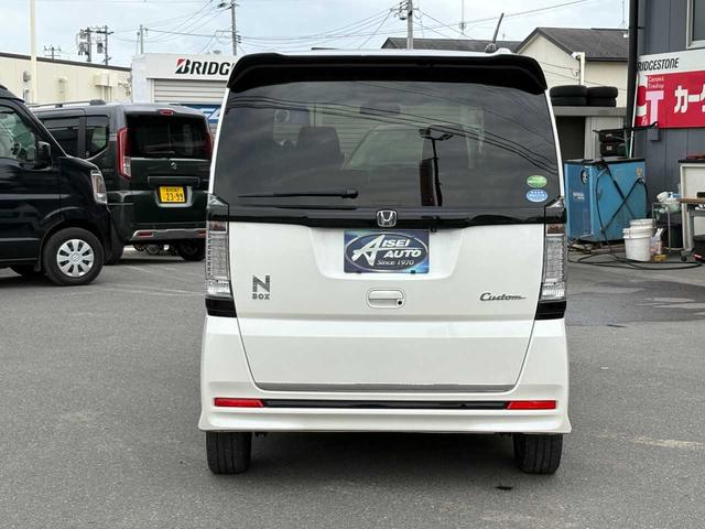N-BOXカスタム 2トーンカラースタイル G・ターボLパッケージ ナビ TV CD DVD Bluetooth バックカメラ ETC クルーズコントロール ハーフレザーシート 両側パワースライドドア 純正15インチアルミ 衝突軽減ブレーキ 整備・保証・鑑定書付き(6枚目)