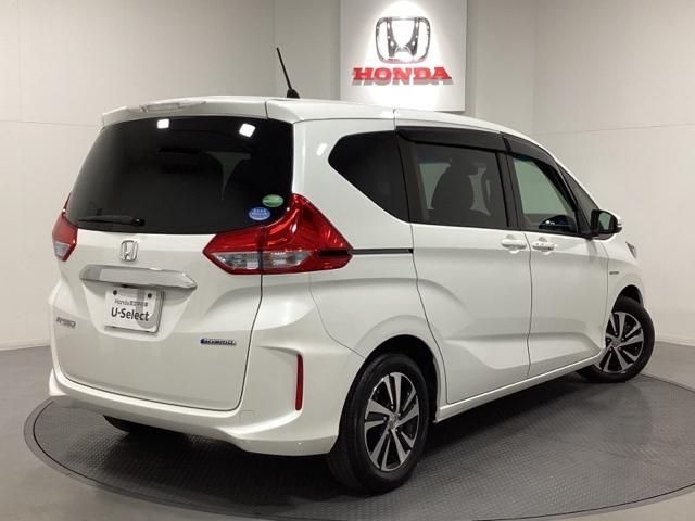 フリードハイブリッド ハイブリッド・Ｇホンダセンシング　純正フルセグメモリーナビ、ルーフモニター、リヤカメラ、ホンダセンシング、ＬＥＤヘッドライト、左右パワースライドドア、ＥＴＣ、スマートキー、純正アルミホイール、ウォークスルー、光触媒抗菌消臭施工済（3枚目）
