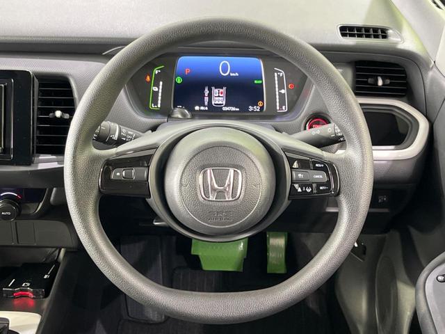 フィット ｅ：ＨＥＶベーシック　ＳＤナビ　４ＷＤ　バックカメラ　寒冷地仕様　衝突被害軽減　レーダークルーズ　禁煙車　コーナーセンサー　スマートキー　ＬＥＤヘッド　ＥＴＣ　オートハイビーム　車線逸脱警報　オートライト　オートエアコン（12枚目）