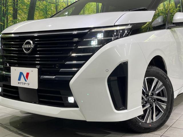 セレナ ハイウェイスターＶ　４ＷＤ　両側電動スライドドア　純正ナビ　全周囲カメラ　エマージェンシーブレーキ　プロパイロット　レーダークルーズ　禁煙車　シートヒーター　スマートキー　ＥＴＣ２．０　ステアリングヒーター　オートライト（12枚目）