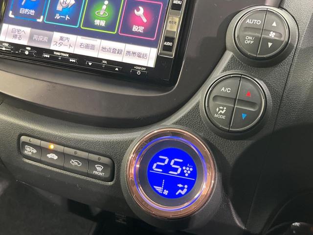 フィットハイブリッド シーズ ファインスタイル 純正ナビ バックカメラ 禁煙車 ETC Bluetooth スマートキー シートヒーター HIDヘッド クルーズコントロール オートライト ステアリングスイッチ 15インチアルミ CD ワンセグ(8枚目)