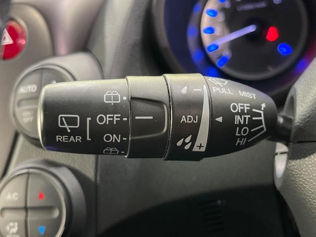 フィットハイブリッド シーズ ファインスタイル 純正ナビ バックカメラ 禁煙車 ETC Bluetooth スマートキー シートヒーター HIDヘッド クルーズコントロール オートライト ステアリングスイッチ 15インチアルミ CD ワンセグ(29枚目)