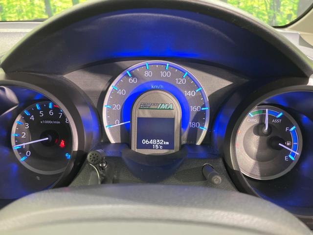 フィットハイブリッド シーズ ファインスタイル 純正ナビ バックカメラ 禁煙車 ETC Bluetooth スマートキー シートヒーター HIDヘッド クルーズコントロール オートライト ステアリングスイッチ 15インチアルミ CD ワンセグ(33枚目)