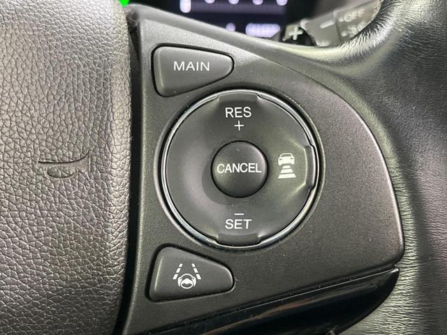 ヴェゼル ハイブリッドZ・ホンダセンシング 純正ナビ バックカメラ 衝突被害軽減システム レーダークルーズ 禁煙車  シートヒーター スマートキー LEDヘッド ETC 車線逸脱警報 オートライト デュアルエアコン 電動パーキングブレーキ(7枚目)