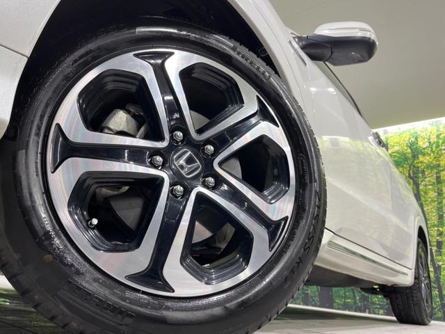 ヴェゼル ハイブリッドZ・ホンダセンシング 純正ナビ バックカメラ 衝突被害軽減システム レーダークルーズ 禁煙車  シートヒーター スマートキー LEDヘッド ETC 車線逸脱警報 オートライト デュアルエアコン 電動パーキングブレーキ(14枚目)