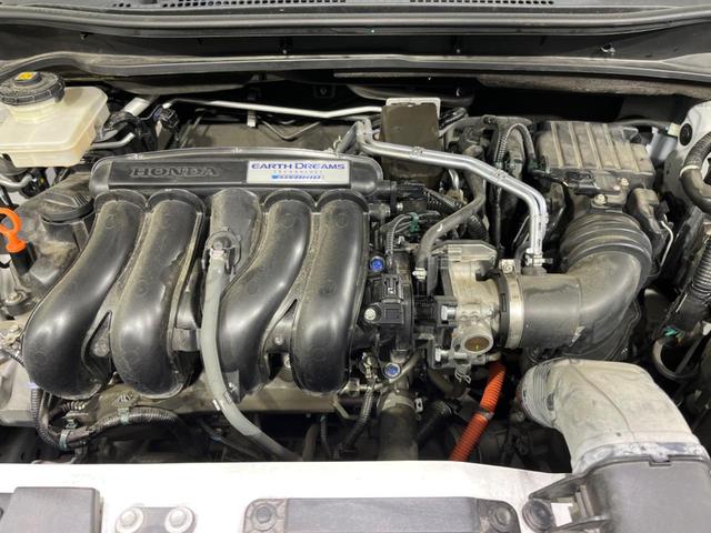 ヴェゼル ハイブリッドZ・ホンダセンシング 純正ナビ バックカメラ 衝突被害軽減システム レーダークルーズ 禁煙車  シートヒーター スマートキー LEDヘッド ETC 車線逸脱警報 オートライト デュアルエアコン 電動パーキングブレーキ(19枚目)