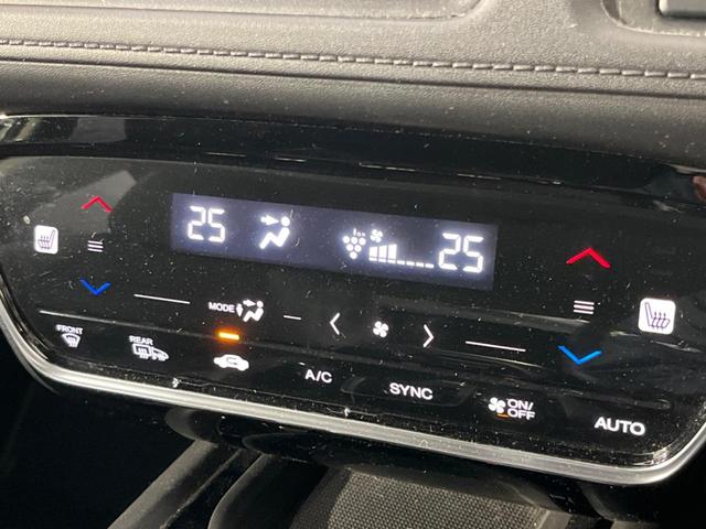 ヴェゼル ハイブリッドZ・ホンダセンシング 純正ナビ バックカメラ 衝突被害軽減システム レーダークルーズ 禁煙車  シートヒーター スマートキー LEDヘッド ETC 車線逸脱警報 オートライト デュアルエアコン 電動パーキングブレーキ(29枚目)