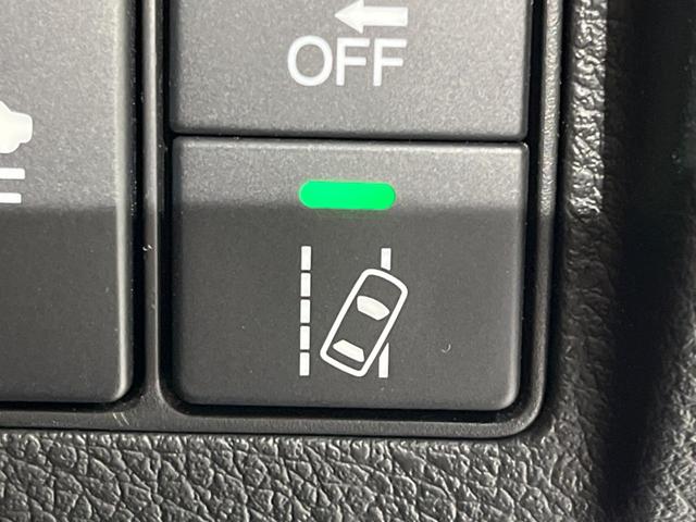 ヴェゼル ハイブリッドZ・ホンダセンシング 純正ナビ バックカメラ 衝突被害軽減システム レーダークルーズ 禁煙車  シートヒーター スマートキー LEDヘッド ETC 車線逸脱警報 オートライト デュアルエアコン 電動パーキングブレーキ(34枚目)