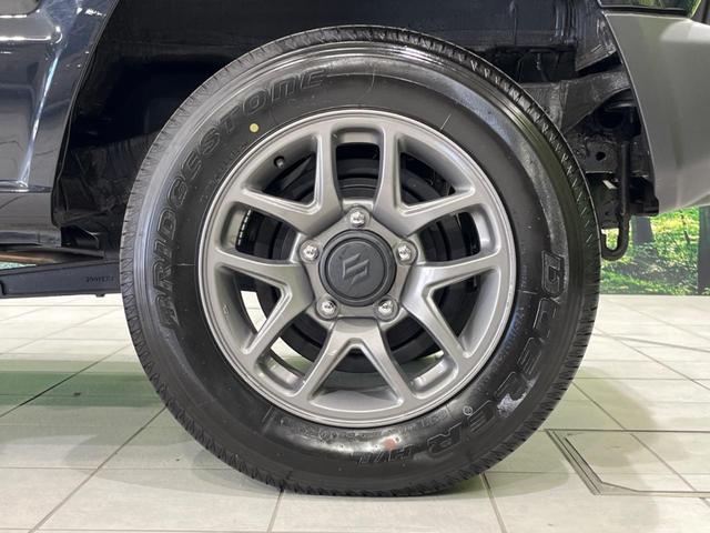 ジムニー XC 4WD ターボ 禁煙車 衝突被害軽減 純正16インチアルミホイール オートハイビーム 車線逸脱警報 LEDヘッド オートライト オートエアコン スマートキー クルコン 電動格納ミラー(51枚目)