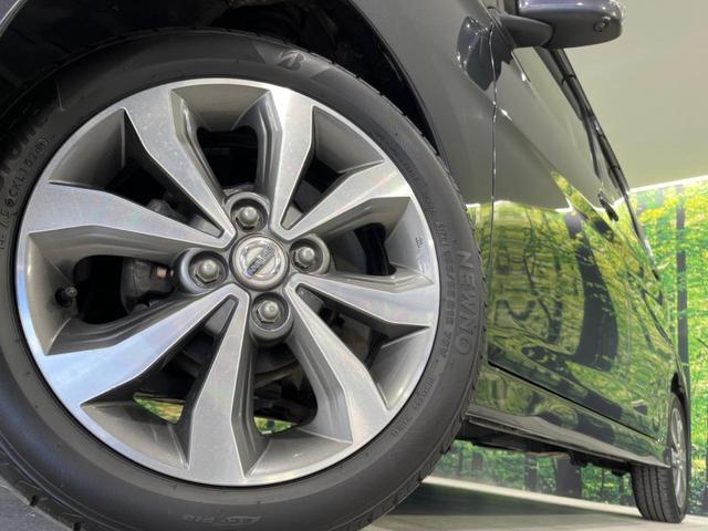 デイズ ハイウェイスター　Ｇ　禁煙車　純正ナビ　Ｂｌｕｅｔｏｏｔｈ／ＣＤ／ＤＶＤ再生　地デジ　全周囲カメラ　純正１５インチアルミホイール　ＨＩＤヘッド　オートライト　オートエアコン　スマートキー　アイドリングストップ　盗難防止装置（13枚目）