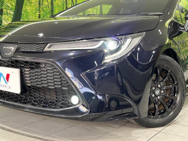カローラツーリング ハイブリッド ダブルバイビー 4WD 衝突軽減装置 ディスプレイオーディオ バックカメラ レーダークルーズ ETC Bluetooth 合皮シート LEDヘッド オートマチックハイビーム スマートキー 革巻きステアリング(12枚目)