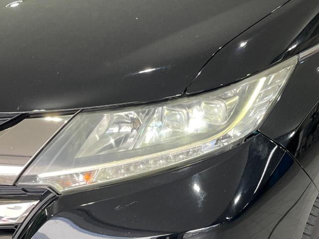 オデッセイ アブソルート・ＥＸ　前期　純正ナビ　後席モニター　７人乗　両側電動スライド　衝突軽減　禁煙車　全周囲カメラ　ＥＴＣ　Ｂｌｕｅｔｏｏｔｈ　ドラレコ　スマートキー　パワーシート　ＬＥＤヘッド　オートライト　純正１８インチＡＷ（51枚目）