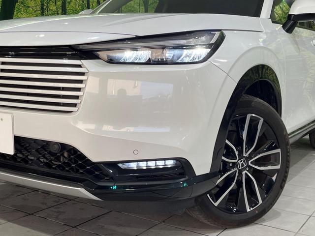 ヴェゼル ｅ：ＨＥＶ　Ｚ　４ＷＤ　ＳＤナビ　バックカメラ　衝突被害軽減装置　ＥＴＣ　Ｂｌｕｅｔｏｏｔｈ　レーダークルーズ　禁煙車　電動リアゲート　ハーフレザーシート　コーナーセンサー　スマートキー　ＬＥＤヘッド（12枚目）