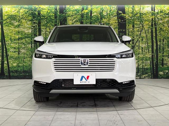 ヴェゼル ｅ：ＨＥＶ　Ｚ　４ＷＤ　ＳＤナビ　バックカメラ　衝突被害軽減装置　ＥＴＣ　Ｂｌｕｅｔｏｏｔｈ　レーダークルーズ　禁煙車　電動リアゲート　ハーフレザーシート　コーナーセンサー　スマートキー　ＬＥＤヘッド（14枚目）