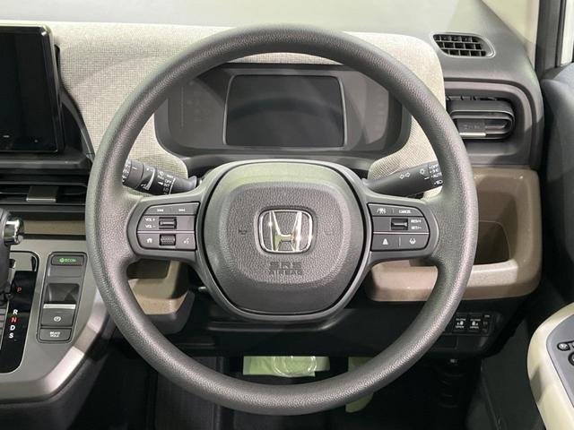 フリード エアー　４ＷＤ　両側電動スライド　衝突軽減装置　禁煙車　純正８型ナビ　レーダークルーズ　デアイサー　バックカメラ　Ｂｌｕｅｔｏｏｔｈ　前席シートヒーター　ＬＥＤヘッド　コーナーセンサー　車線逸脱警報（11枚目）