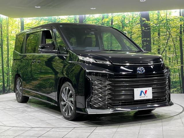 ヴォクシー ハイブリッドＳ－Ｚ　寒冷地仕様　後席モニター　純正１０．３型デイスプレイオーディオ　両側電動　バックカメラ　１００Ｖ電源　衝突被害軽減　禁煙車　コーナーセンサー　ＬＥＤヘッド　ＥＴＣ２．０　純正１７インチＡＷ（16枚目）