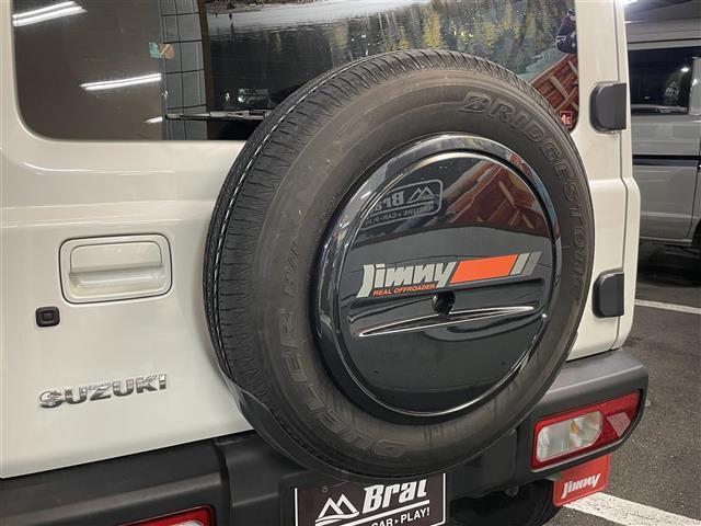 ジムニー XC 切替4WDオートマ ターボ 純正オプションサイドデカール 純正オプションスペアタイヤハーフカバーデカール 純正オプションマッドフラップ クラリオンオーディオ(CD/FM/USB) 純正アルミ クルコン(7枚目)