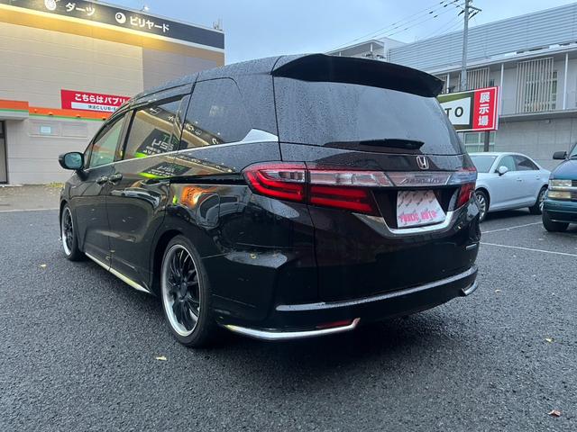 オデッセイハイブリッド ハイブリッドアブソルート・ホンダセンシングＥＸパック　本革シート　３６０°カメラ　駐車アシスト　両側自動スライドドア　車線逸脱防止　盗難防止　キーレス　サイドエアバッグ　エコモード　ＤＶＤ再生可　ＶＳＡ　Ｂｌｕｅｔｏｏｔｈオーディオ　スマキー　３列シート（7枚目）