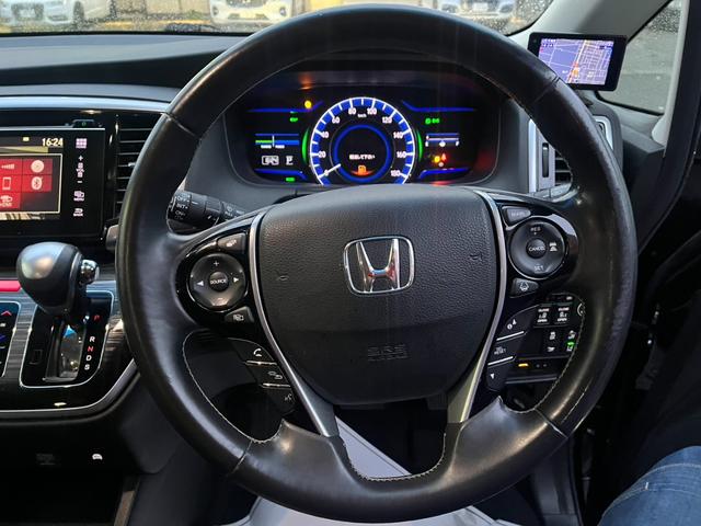 オデッセイハイブリッド ハイブリッドアブソルート・ホンダセンシングＥＸパック　本革シート　３６０°カメラ　駐車アシスト　両側自動スライドドア　車線逸脱防止　盗難防止　キーレス　サイドエアバッグ　エコモード　ＤＶＤ再生可　ＶＳＡ　Ｂｌｕｅｔｏｏｔｈオーディオ　スマキー　３列シート（36枚目）