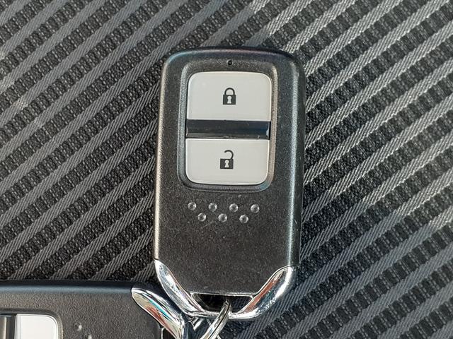 L ホンダセンシング 衝突被害軽減ブレーキ レーンアシスト クルコン メモリーナビ フルセグTV バックカメラ プッシュスタート ステリモ オートライト フォグランプ Bluetooth・USB接続可 HIDライト(32枚目)