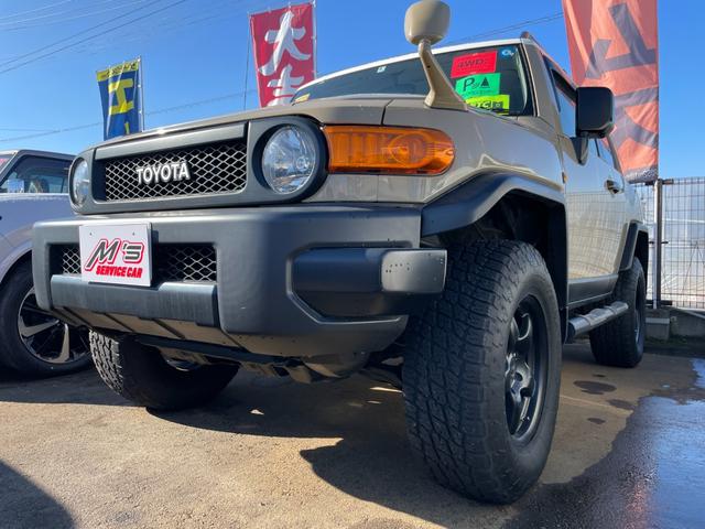 カラーパッケージ パートタイム4WD クリアランスソナー 純正ナビ クルコン 社外マフラー 社外ステップ ソフトアップ ETC 社外17AW(40枚目)