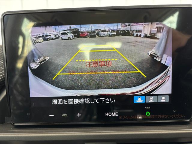 フリード ｅ：ＨＥＶエアー　ＥＸ　４ＷＤ　登録済未使用車　ディスプレイオーディオ　バックカメラ　シートヒーター　両側電動スライドドア　クリアランスソナー　レーンアシスト　ＢＳＭ　ＥＣＯＮ　フロントデアイサー　ＵＳＢ　ＨＤＭＩ　ＢＴ接続（12枚目）