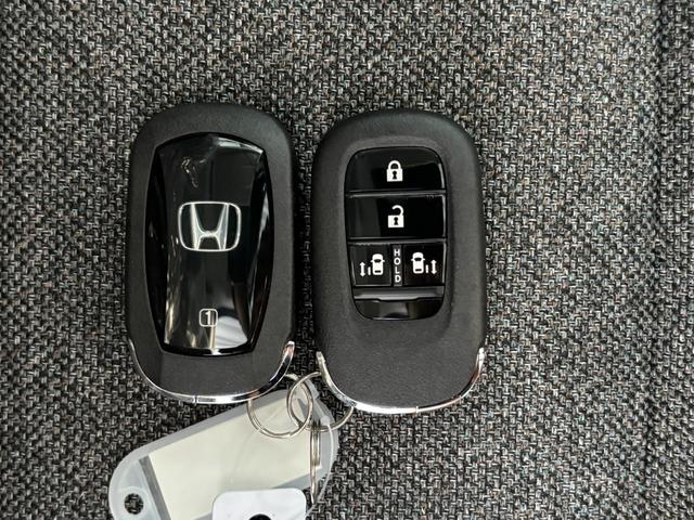 フリード ｅ：ＨＥＶエアー　ＥＸ　４ＷＤ　登録済未使用車　ディスプレイオーディオ　バックカメラ　シートヒーター　両側電動スライドドア　クリアランスソナー　レーンアシスト　ＢＳＭ　ＥＣＯＮ　フロントデアイサー　ＵＳＢ　ＨＤＭＩ　ＢＴ接続（36枚目）