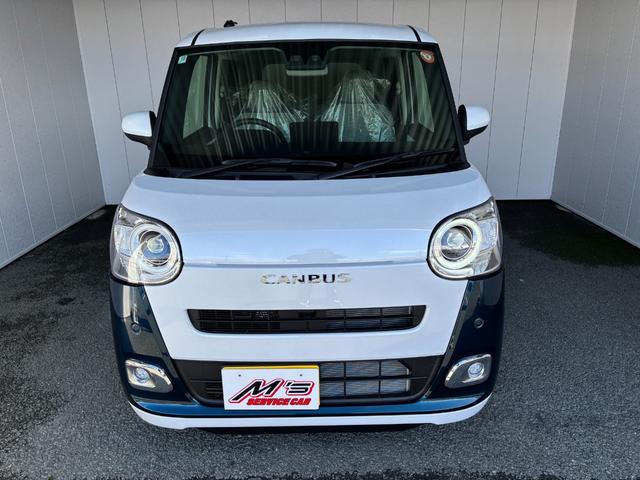 ムーヴキャンバス ストライプスＧ　４ＷＤ　届出済未使用車　衝突被害軽減ブレーキ　バックカメラ　シートヒーター　ドリンクヒーター　両側電動スライドドア　クリアランスソナー　レーンアシスト　オートライト　オートハイビーム　パワーモード（3枚目）