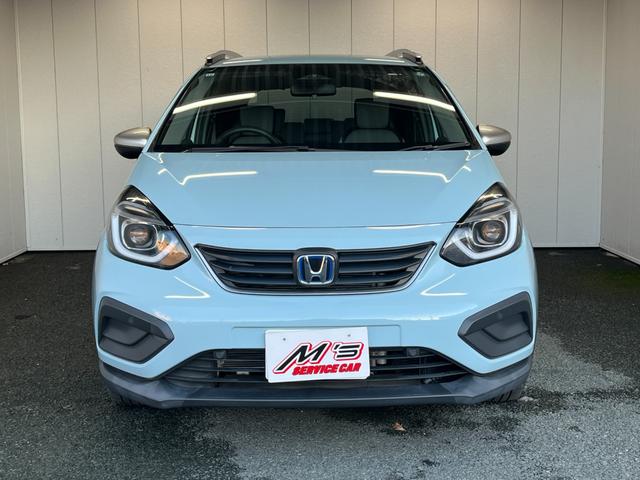 フィット e:HEVクロスター 4WD ETC 純正ナビ バックモニター ワンセグTV クルコン オートライト LEDライト 衝突被害軽減ブレーキ 横滑り防止装置 レーンアシスト フロントデアイサー クリアランスソナー ECON(3枚目)