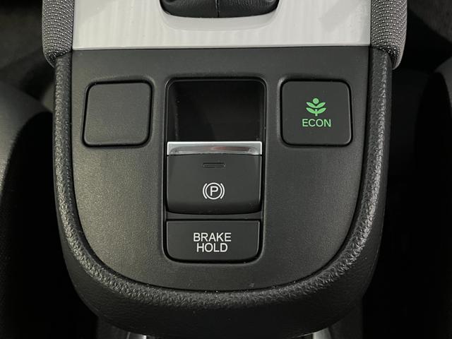 フィット e:HEVクロスター 4WD ETC 純正ナビ バックモニター ワンセグTV クルコン オートライト LEDライト 衝突被害軽減ブレーキ 横滑り防止装置 レーンアシスト フロントデアイサー クリアランスソナー ECON(21枚目)