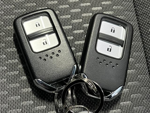 フィット e:HEVクロスター 4WD ETC 純正ナビ バックモニター ワンセグTV クルコン オートライト LEDライト 衝突被害軽減ブレーキ 横滑り防止装置 レーンアシスト フロントデアイサー クリアランスソナー ECON(36枚目)