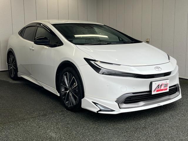 プリウス Z 4WD 前後ドラレコ ETC2 純正ナビ 全周囲モニター モデリスタエアロ 置くだけ充電 クルコン ステアリングヒーター シートヒーター パワーシート クリアランスソナー 100V電源 オートライト(4枚目)