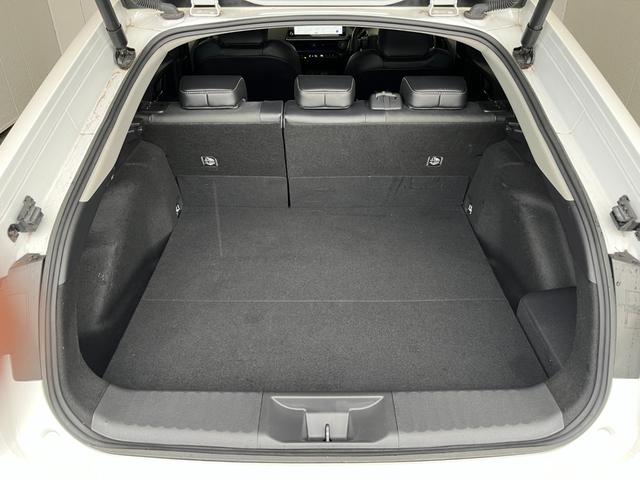 プリウス Z 4WD 前後ドラレコ ETC2 純正ナビ 全周囲モニター モデリスタエアロ 置くだけ充電 クルコン ステアリングヒーター シートヒーター パワーシート クリアランスソナー 100V電源 オートライト(52枚目)