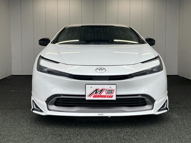 プリウス Z 4WD 前後ドラレコ ETC2 純正ナビ 全周囲モニター モデリスタエアロ 置くだけ充電 クルコン ステアリングヒーター シートヒーター パワーシート クリアランスソナー 100V電源 オートライト(55枚目)