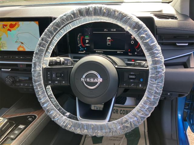 オーラ Ｇ　ＦＯＵＲ　４ＷＤ　全周囲カメラ　ナビ　ＴＶ　クリアランスソナー　衝突被害軽減システム　アルミホイール　オートマチックハイビーム　オートライト　ＬＥＤヘッドランプ　スマートキー　アイドリングストップ（3枚目）