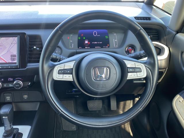 フィット ｅ：ＨＥＶホーム　純正９型メモリーナビ　フルセグ　ＤＶＤ　Ｂｌｕｅｔｏｏｔｈ　バックカメラ　ホンダセンシング　パーキングセンサー　ワイパーデアイサー　ＬＥＤライト　前後ドラレコ　ＥＴＣ（10枚目）