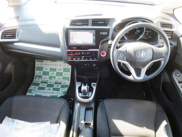 フィットハイブリッド Ｆ　４ＷＤ　バックカメラ　プッシュスタート　オートエアコン・ライト　スターター　新規格ＥＴＣ　フロア７ＡＴ（12枚目）