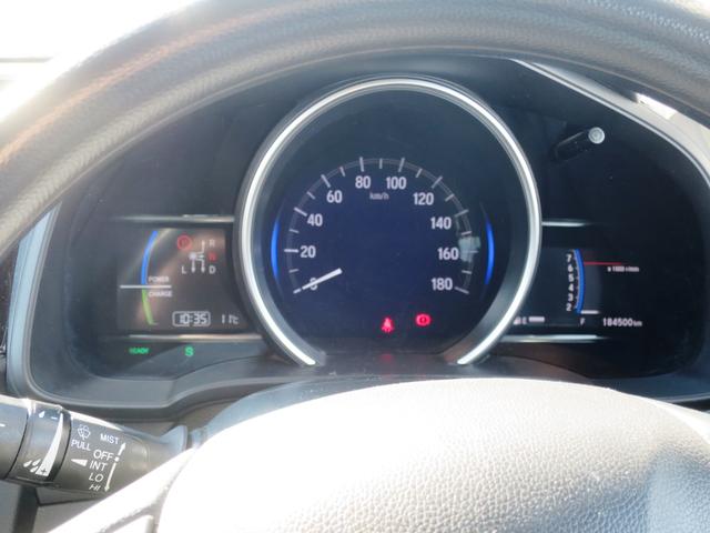 フィットハイブリッド Ｆ　４ＷＤ　バックカメラ　プッシュスタート　オートエアコン・ライト　スターター　新規格ＥＴＣ　フロア７ＡＴ（14枚目）