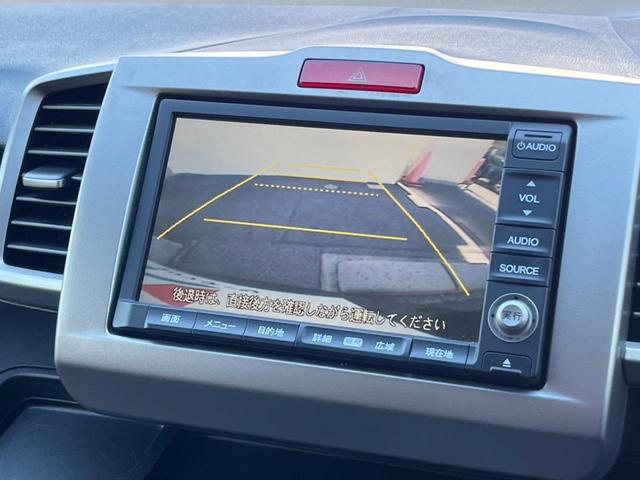 フリードハイブリッド ジャストセレクション フリップダウンモニター 助手席側パワースライドドア 純正ナビ バックカメラ ドライブレコーダー ETC スマートキー オートライト オートエアコン クルーズコントロール HIDヘッドライト(6枚目)