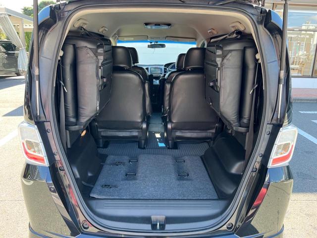 フリードハイブリッド ジャストセレクション フリップダウンモニター 助手席側パワースライドドア 純正ナビ バックカメラ ドライブレコーダー ETC スマートキー オートライト オートエアコン クルーズコントロール HIDヘッドライト(11枚目)