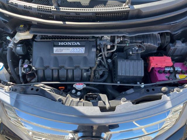 フリードハイブリッド ジャストセレクション フリップダウンモニター 助手席側パワースライドドア 純正ナビ バックカメラ ドライブレコーダー ETC スマートキー オートライト オートエアコン クルーズコントロール HIDヘッドライト(19枚目)