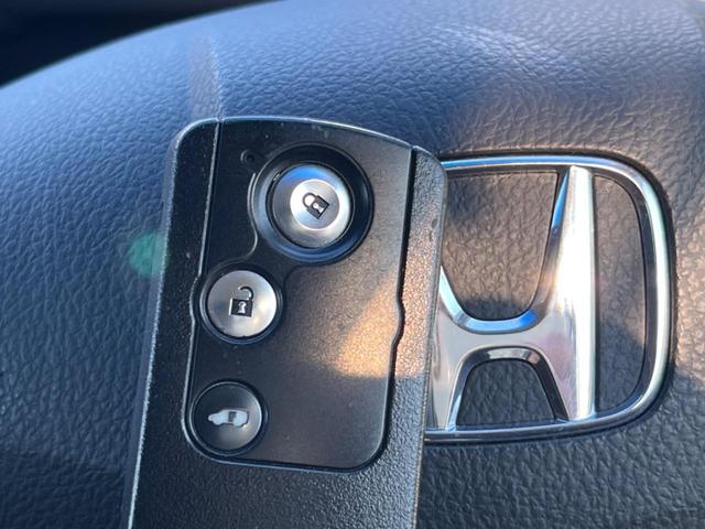 フリードハイブリッド ジャストセレクション フリップダウンモニター 助手席側パワースライドドア 純正ナビ バックカメラ ドライブレコーダー ETC スマートキー オートライト オートエアコン クルーズコントロール HIDヘッドライト(36枚目)